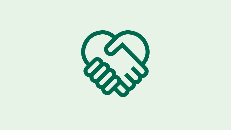 Grafikk som viser to grønne hender som holder hverandre og former et hjerte.